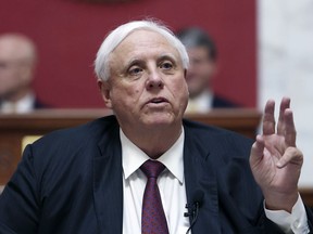 West Virginia Gov. Jim Justice signed a bill Wednesday, March 1, 2023, allowing people with concealed carry permits to bring firearms on public college and university campuses in the state.