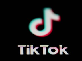 FILE - The icon for the video sharing TikTok app is seen on a smartphone, on Feb. 28, 2023. China accused the United States on Thursday, March 16, of spreading disinformation and suppressing TikTok following reports that the Biden administration was calling for its Chinese owners to sell their stakes in the popular video-sharing app.