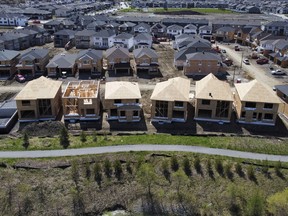 New homes are built in a housing construction development in the west-end of Ottawa on Thursday, May 6, 2021.&ampnbsp;Projections in Ontario's budget for housing starts show the province's target to build 1.5 million homes in 10 years slipping further out of reach with each passing year.