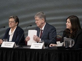 From left to right, commissioners Leanne Fitch, Michael MacDonald, chair, and Kim Stanton deliver the final report of the Mass Casualty Commission inquiry into the mass murders in rural Nova Scotia in Truro, N.S. on Thursday, March 30, 2023.