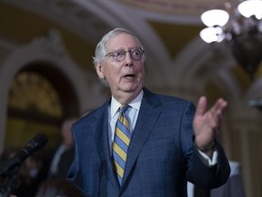 Senate Minority Leader Mitch McConnell, R-Ky., speaks to reporters following a closed-door policy meeting, at the Capitol in Washington on March 7.