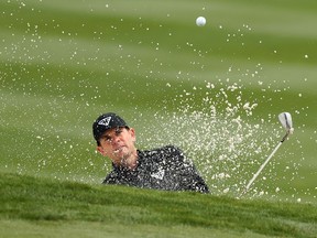 Brendan Steele hits from the bunker on the 5th hole during the final round of the LIV Golf event at The Gallery Golf Club.