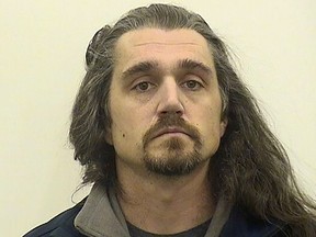 This booking image provided by Adams County, Illl., administration, shows Timothy Bliefnick of Quincy, Ill., who has been charged charged with first-degree murder in the death of his estranged wife, Rebecca Bliefnick. Bliefnick, 39, who once appeared on an episode of the television game show "Family Feud", pleaded not guilty Friday afternoon, March 24, 2023, at his arraignment in Adams County Circuit Court in Quincy, Ill. (Adams County, Illl., Administration via AP)