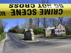 A police crime scene tape is seen at the entrance to Covenant School in Nashville, Tenn. Monday, March 27, 2023. Officials say several children were killed in a shooting at the private Christian grade school in Nashville. The suspect is dead after a confrontation with police.
