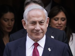FILE - Israeli Prime Minister Benjamin Netanyahu leaves 10 Downing Street after a meeting with Britain's Prime Minister Rishi Sunak in London, March 24, 2023. Israel's Prime Minister Benjamin Netanyahu late Tuesday March 28, 2023, said his country's intelligence agency Mossad helped Greece prevent a terrorist attack planned against at least one Jewish site in Athens.