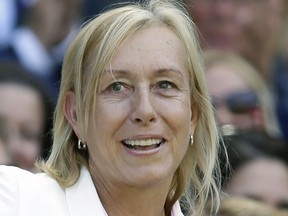 FILE - Tennis great Martina Navratilova is shown in the royal box on Centre Court at the All England Lawn Tennis Championships in Wimbledon, London, Saturday July 4, 2015. Navratilova says she has been told by doctors that, "as far as they know, I'm cancer-free," and that she should be "good to go" after some additional radiation treatment. The 66-year-old Navratilova, an 18-time Grand Slam singles champion and member of the International Tennis Hall of Fame, discussed her health in an interview with Piers Morgan on TalkTV scheduled to be aired Tuesday, March 21, 2023.