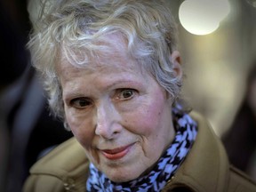 FILE - E. Jean Carroll talks to reporters outside a courthouse on March 4, 2020, in New York. Former President Donald Trump's effort to keep key evidence out of his upcoming civil rape trial was rejected by a federal judge, Monday, March 20, 2023. The trial in the case filed by Carroll is scheduled to start April 25.