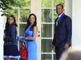 FILE - Tiger Woods, right, with his daughter Sam Alexis Woods, left, and his girlfriend Erica Herman, centre. Herman wants to nullify a nondisclosure agreement following a six-year relationship with the professional golfer, according to court records Monday, March 6, 2023.