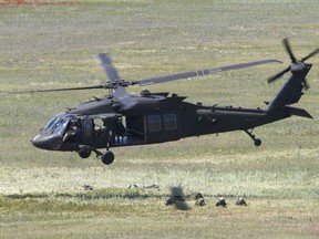 FILE - A U.S. Black Hawk helicopter takes off after deploying soldiers during the Swift Response 22 military exercise at the Krivolak army training polygon in the central part of North Macedonia, May 12, 2022. Two U.S. Army Black Hawk medical evacuation helicopters crashed during training Wednesday night, March 29, 2023, in Kentucky, killing nine soldiers. The Black Hawk is a twin-engine, four-bladed, medium-lift, utility helicopter developed for the U.S. Army since the 1970s by Sikorsky Aircraft of Stratford, Conn.