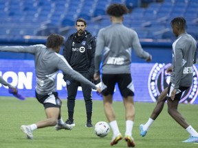 CF Montreal head coach Hernan Losada looks over a practice during the first day of training camp in Montreal, Monday, Jan. 9, 2023. Under a new coach, there are always growing pains and CF Montreal experienced that firsthand, dropping the first game of the Hernan Losada era in a 2-0 on the road to Inter Miami.