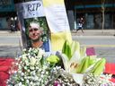 A memorial is set up in remembrance of stabbing victim Paul Stanley Schmidt, 37, outside a Starbucks coffee shop in downtown Vancouver on March 28.