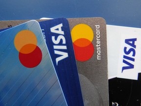 Credit cards are seen Thursday, July 1, 2021, in Orlando, Fla. Canadian credit card debt soared in the last three months of 2022 amid rising interest rates and stubbornly high inflation with younger Canadians in particular relying on credit to make ends meet.