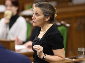 Deputy Prime Minister and Finance Minister Chrystia Freeland rises during Question Period in the House of Commons on Parliament Hill in Ottawa on Monday, February 13, 2023. As the federal government readies its spring budget, a climate group is urging Ottawa to pursue a "made-in-Canada" response to U.S. clean energy incentives.