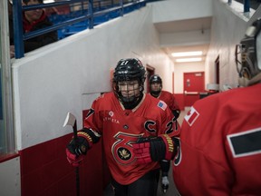 Shiann Darkangelo from the Toronto Six of the Premier Hockey Federation makes her way to the ice for warm up before playing against the Connecticut Whale, at the Canlan Sports at York University in Toronto, on Saturday, January 21, 2023.