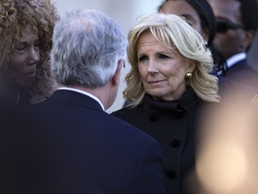 First lady Dr. Jill Biden listens to Nashville mayor John Cooper during a vigil held for victims of The Covenant School shooting on Wednesday, March 29, 2023, in Nashville, Tenn.