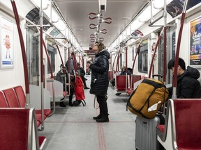 Passengers ride the subway in Toronto on Friday, January 27, 2023.