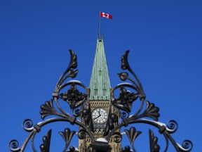 As the federal government drafts its spring budget, fiscal experts say it should consider stricter spending rules and higher taxes to improve federal finances. The Peace Tower is pictured on Parliament Hill in Ottawa on Tuesday, Jan. 31, 2023.