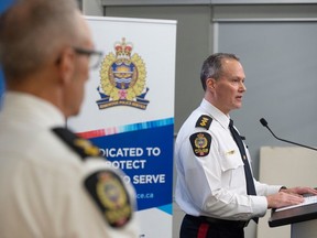 Edmonton Police Deputy Chief Devin Laforce, right, and Supt. Shane Perka of the EPS Criminal Investigations Division provide an update on the investigation on March 23, 2023 into the deaths of two officer in Edmonton a week prior.