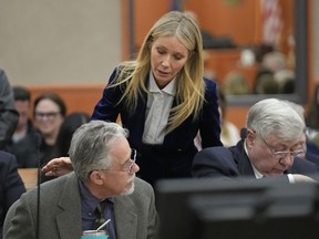 Gwyneth Paltrow speaks with retired optometrist Terry Sanderson,left, as she walks out of the courtroom following the reading of the verdict in their lawsuit trial, Thursday, March 30, 2023, in Park City, Utah. Paltrow won her court battle over a 2016 ski collision at a posh Utah ski resort after a jury decided Thursday that the movie star wasn't at fault for the crash.