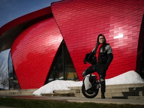 Gabriel Kwok poses for a photograph with his electric unicycle in Vancouver, on Thursday, March 2, 2023. Since Kwok first started riding the electric unicycle on the streets of Vancouver nine months ago, he estimates he's logged about 2,000 kilometres on the so-called micro mobility device. The 21-year-old Emily Carr film student has a car when he needs to haul people or cargo, but his "wheel" is now his main means of transportation to commute to school and get around the city.