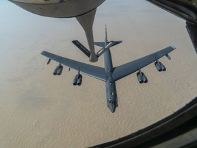 FILE - A U.S. Air Force B-52H "Stratofortress" from Minot Air Force Base, N.D., is refueled by a KC-135 "Stratotanker" in the U.S. Central Command area of responsibility, Dec. 30, 2020. Six Air Force officers who were in charge of caring for the infrastructure, fuel and logistics support for a North Dakota nuclear missile base were relieved of command due to a loss of confidence in their ability to carry out their responsibilities, the Air Force said.