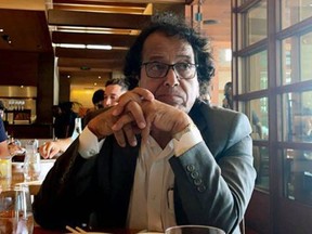 In this photo provided by Ibrahim Almadi, Saad Ibrahim Almadi sits in a restaurant in an unidentified place, in the United States, on August 2021. Saudi Arabia has freed the Saudi-American citizen it had imprisoned more than a year over his old tweets critical of the kingdom's crown prince.