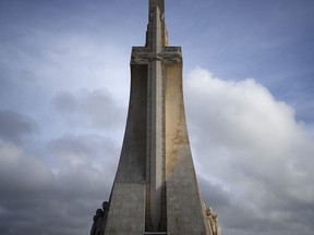 The sword of the Royal House of Avis on a stylised cross decorates the 56-meter high Monument to the Discoveries by the Tagus river in Lisbon, Thursday, March 30, 2023. The sword and cross on the monument symbolized the growth of the Portuguese empire and faith. This Thursday, the Vatican formally repudiated the "Doctrine of Discovery." The statement was a response to decades of Indigenous demands for the Vatican to formally rescind the papal bulls that provided the Portuguese and Spanish kingdoms the religious backing to expand their territories in Africa and the Americas for the sake of spreading Christianity.