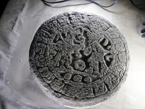 Mexican archaeologists found a circular-shaped Mayan scoreboard used for a ball game at Chichen Itza's archaeological site, Mexican Anthropology and History Institute (INAH), in this handout picture released on April 10, 2023.