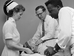A patient in 1955 at a mental hospital undergoes electroconvulsive therapy (ECT),