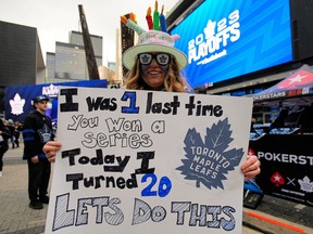 Apr 18, 2023; Toronto, Ontario, CAN; A Toronto Maple Leafs fan holds up a sign in Maple Leafs Square before game one of the first round of the 2023 Stanley Cup Playoffs between the Tampa Bay Lightning and Toronto Maple Leafs at Scotiabank Arena.