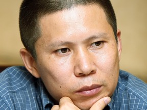 Legal scholar Xu Zhiyong in 2009. Xu and Ding Jiaxi, two prominent human rights lawyers, have been sentenced to more than a decade in prison, Human Rights Watch says.