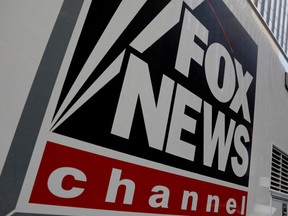 A Fox News channel sign is seen on a television vehicle outside the News Corporation building in New York City, in New York, U.S. November 8, 2017.