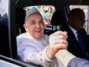 Pope Francis leaves the Gemelli hospital on April 1, 2023 in Rome, after being discharged following treatment for bronchitis.