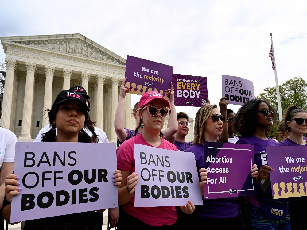 Abortion rights advocates rally outside the U.S. Supreme Court on April 14, 2023, in Washington, D.C., speaking out against abortion pill restrictions.