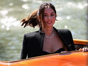 Cuban Spanish actress Ana de Armas arrives on September 8, 2022 at the pier of the Palazzo del Cinema during the 79th Venice International Film Festival at Lido di Venezia in Venice, Italy.