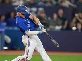 Blue Jays third baseman Matt Chapman hits a home run against the Detroit Tigers during the fourth inning at Rogers Centre, April 11, 2023..