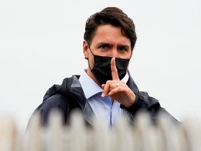 Prime Minister Justin Trudeau gestures to his staff during a stop in Richmond, B.C. during the 2021 federal election.