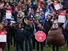 PSAC workers gather on a picket line in Ottawa, Wednesday, April 19, 2023. THE CANADIAN PRESS/Sean Kilpatrick