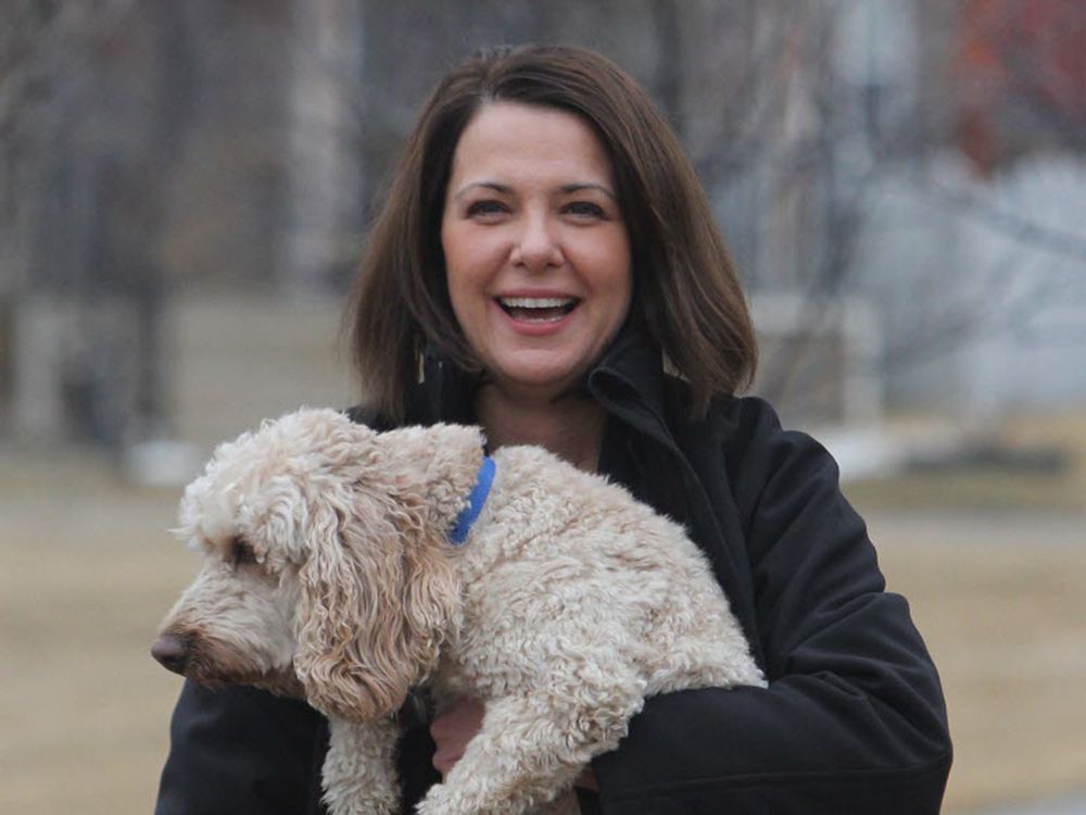 Danielle Smith and her dog Caine