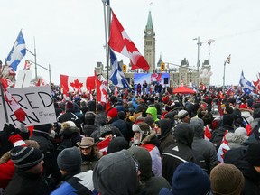 Freedom Convoy protesters gather near Parliament Hill in Ottawa, February 12, 2022.