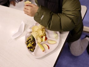 FILE: A student eats a vegan meal served for lunch at Yung Wing School P.S. 124 on February 04, 2022 in New York City.