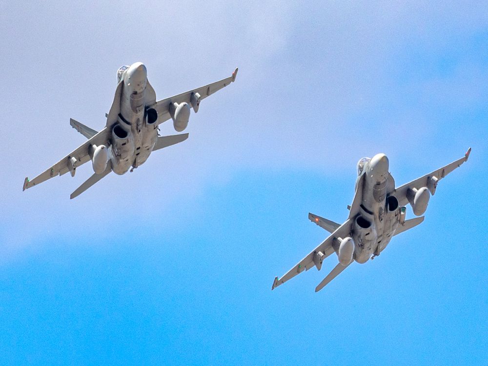 NextImg:CF-18s fire 'final warning' flares at private plane intercepted above G7 summit site