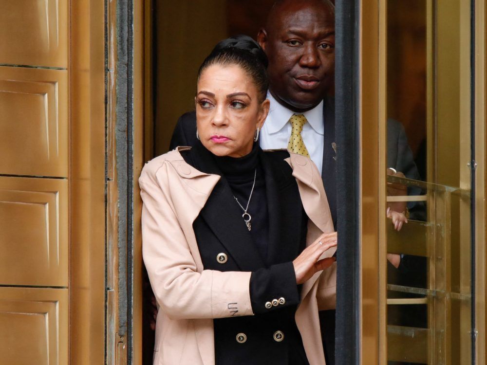 Kathryn Townsend Griffin, daughter of singer-songwriter Ed Townsend, followed by attorney Benjamin Crump, leaves Manhattan federal court after testimony in the copyright infringement suit against British singer-songwriter Ed Sheeran, April 25, 2023, in New York.