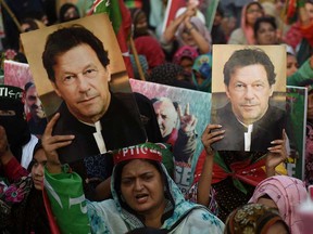 Supporters of former Pakistani prime minister Imran Khan protest in Karachi on March 19, 2023, demanding the release of party workers arrested in recent police clashes.