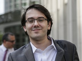 FILE - Martin Shkreli, former chief executive officer of Turing Pharmaceuticals AG, left, exits federal court in the Brooklyn borough of New York, U.S., on Thursday, June 29, 2017.