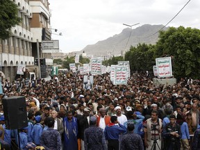 Houthi supporters chant slogans as they attend a rally marking eight years for a Saudi-led coalition, Friday, March 26, 2023, in Sanaa, Yemen.