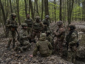 Members of the Ukrainian National Guard from the Bureviy Brigade take part in a military exercise in the Kyiv region on Thursday, April 27, 2023.