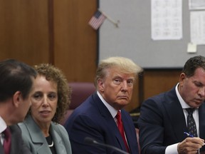 Former President Donald Trump appears in court for his arraignment in New York, Tuesday, April 4, 2023. Trump surrendered to authorities ahead of his arraignment on criminal charges stemming from a hush money payment to Stormy Daniels during his 2016 campaign.