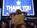 Toronto Maple Leafs fans react after game 7 of NHL playoff hockey against the Tampa Bay Lightning, in Toronto, Saturday, May 14, 2022. Toronto Maple Leafs fans are expected to gather at Maple Leaf Square in downtown Toronto tonight, as the team tries to advance to the second round of the playoffs for the first time since 2004.