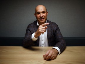 Canadian businessman and former Research In Motion co-CEO and chair Jim Balsillie is shown during an interview in Toronto, Monday, April 17, 2023. Balsillie is having his Hollywood moment -- he's played by Glenn Howerton in the new Canadian dark comedy "BlackBerry" in a portrayal he sees as "satire."